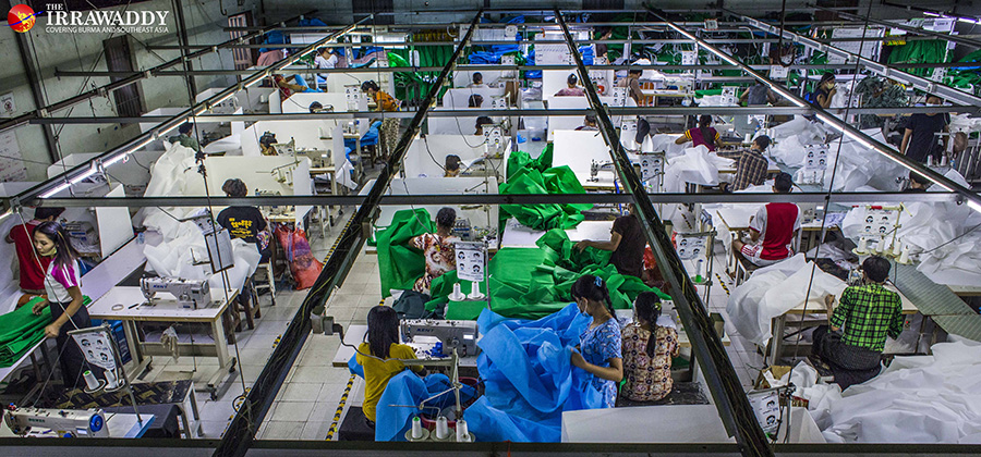 လှိုင်သာယာ စက်မှုဇုန်ရှိ အထည်ချုပ် စက်ရုံ လုပ်ငန်းခွင်တခု  / ဧရာဝတီ